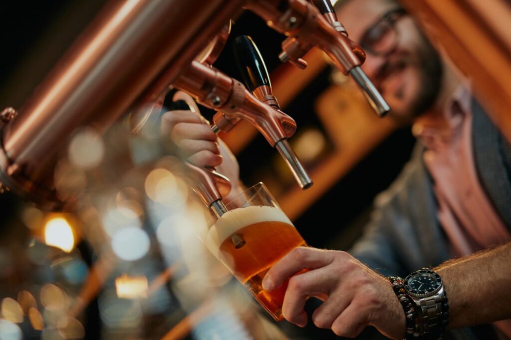 bartender pouring beer