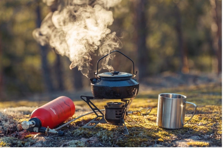 A kettle on a camping stove