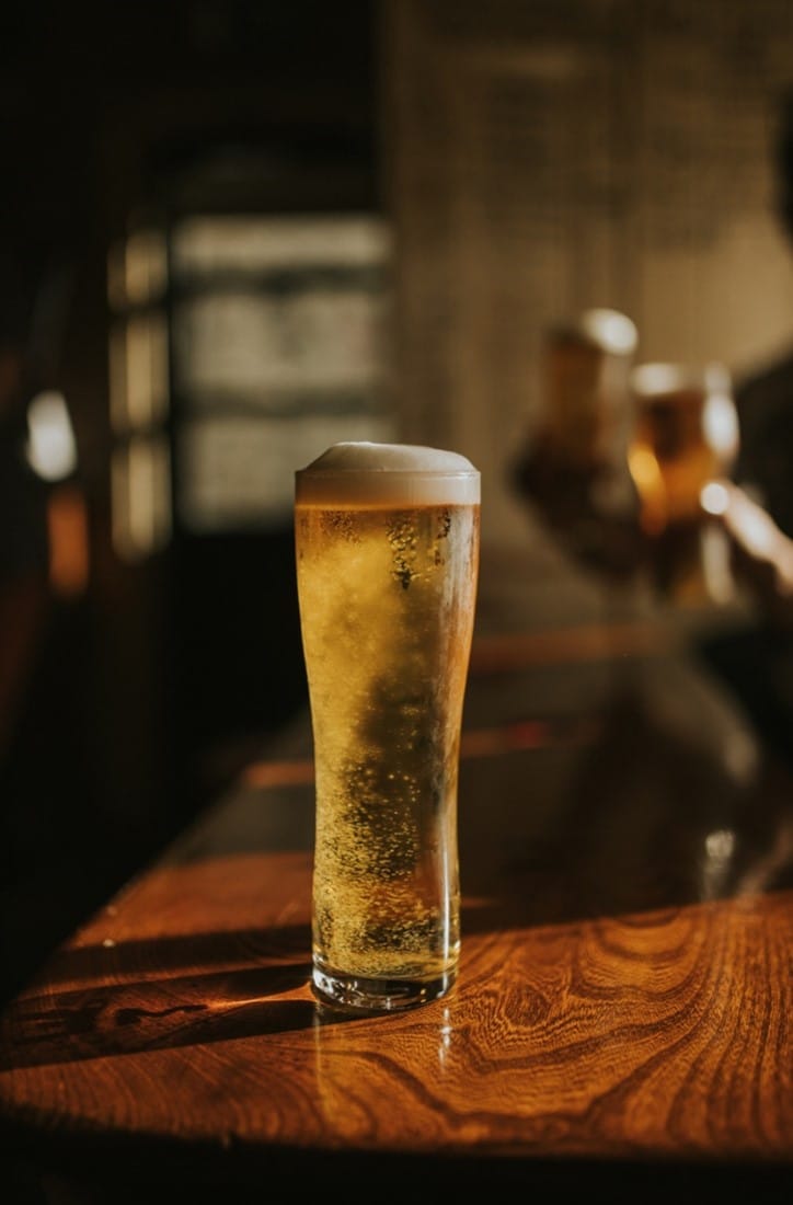 A glass of beer on a table