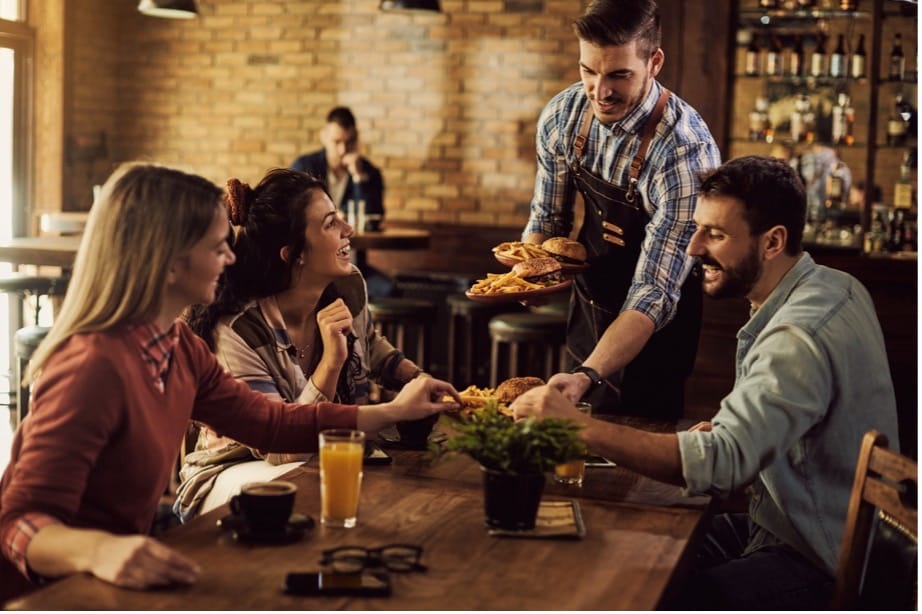 A group of people sitting at a table