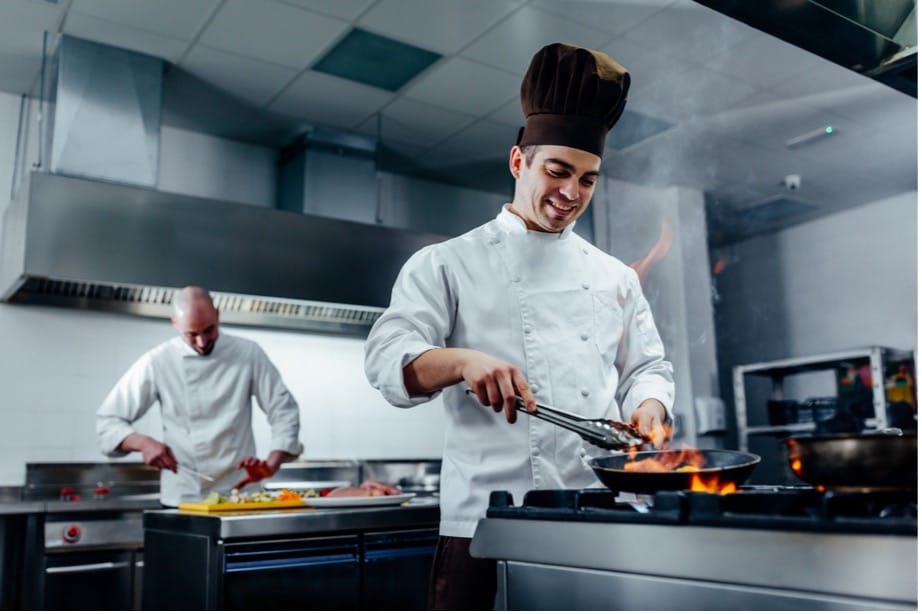 A chef cooking in a kitchen